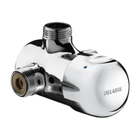 Photo of DELABIE TEMPOMIX surface-mounted time flow shower mixer, M3/4", in-line connections, 90mm centres, with knob-pushbutton
